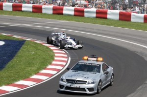 Nick Heidfeld follows the safety car